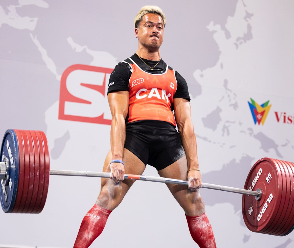 Man deadlifting